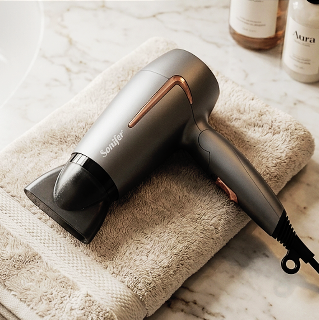 Secador de Cabelo Sonifer SF-9706 1400W Silencioso com Pega Dobrável e Bico de Precisão